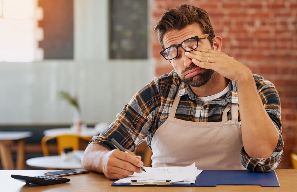 small business owner is frustrated and overwhelmed